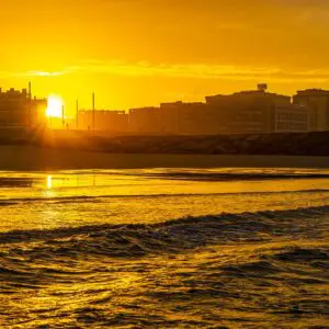 Zonsopkomst-vanaf-het-water-costa-da-caparica