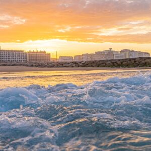 zonsopkomst-vanaf-het-water-costa-da-caparica-portugal