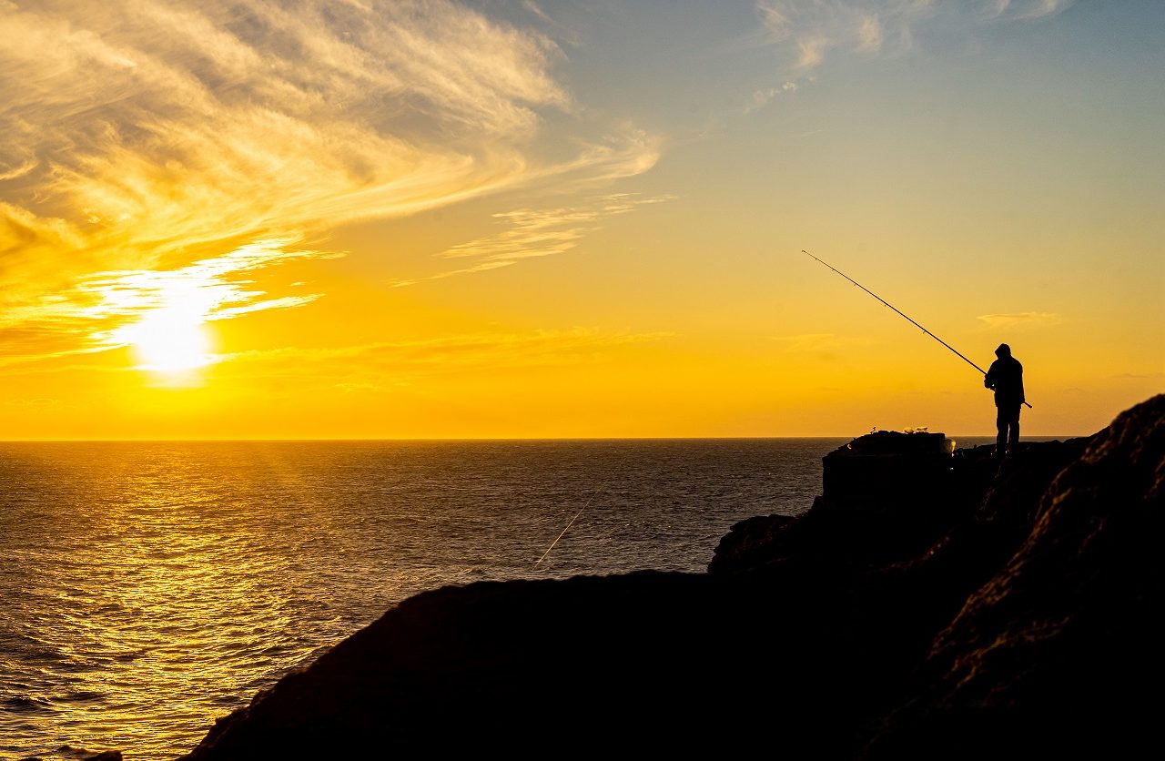 Zonsondergang-vissers-Peniche-Portugal
