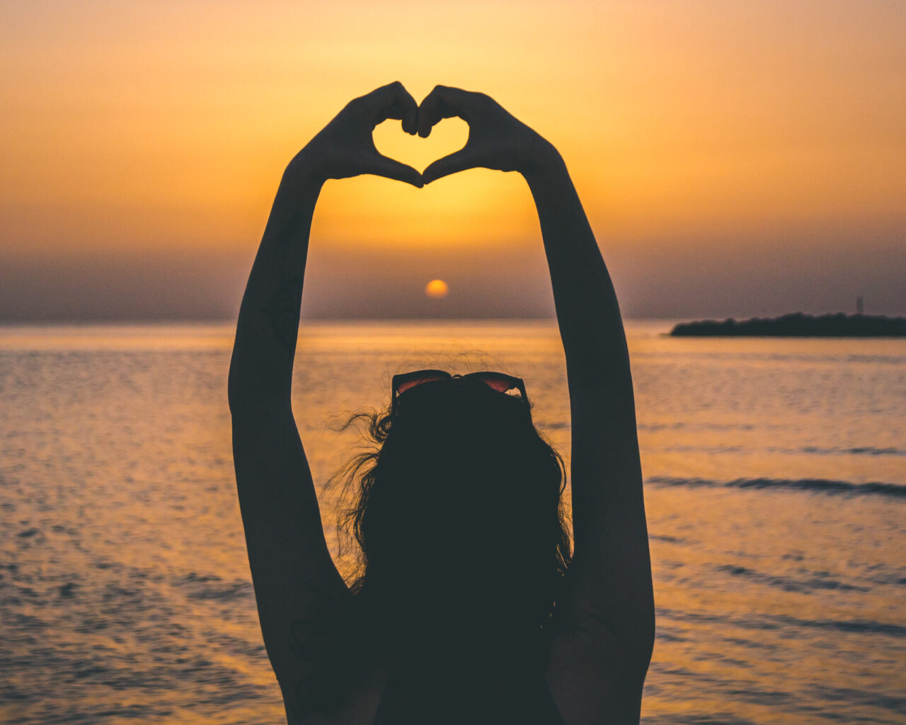 Jessica-heart-shape-hands-sunset
